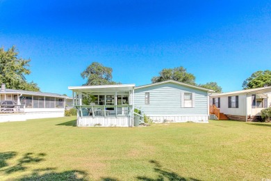 Welcome to Oceanside Landing, a highly sought-after 55+