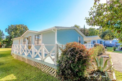 Welcome to Oceanside Landing, a highly sought-after 55+