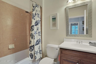 Coastal charm abounds from the moment you step inside this