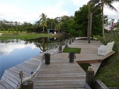 Country elegance & modern comfort on this beautiful 5-acre Palm