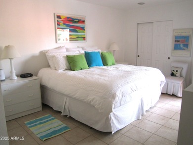 Step into this open and bright condo that blends warmth and