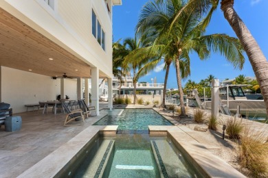 Experience the pinnacle of luxury waterfront living in this