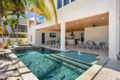 Experience the pinnacle of luxury waterfront living in this