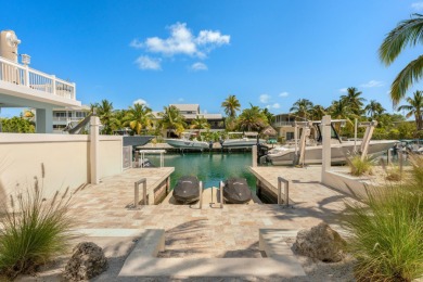 Experience the pinnacle of luxury waterfront living in this