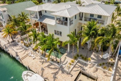 Experience the pinnacle of luxury waterfront living in this