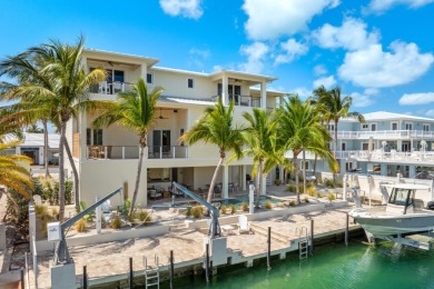 Experience the pinnacle of luxury waterfront living in this