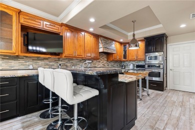 Luxury Island living awaits in this stunning waterfront home on