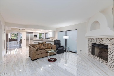 Located in the prestigious guard-gated Las Vegas Country Club