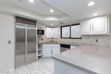 Located in the prestigious guard-gated Las Vegas Country Club