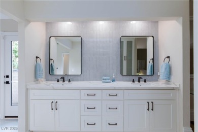 Located in the prestigious guard-gated Las Vegas Country Club