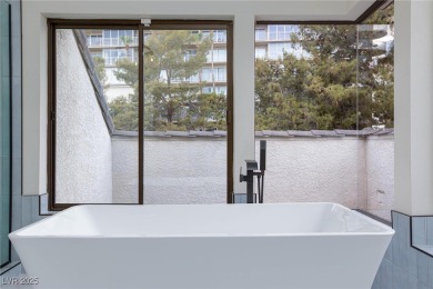 Located in the prestigious guard-gated Las Vegas Country Club