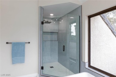 Located in the prestigious guard-gated Las Vegas Country Club