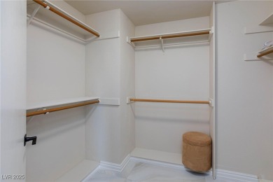 Located in the prestigious guard-gated Las Vegas Country Club