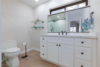 Located in the prestigious guard-gated Las Vegas Country Club