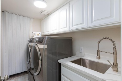 Located in the prestigious guard-gated Las Vegas Country Club