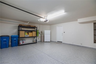 Located in the prestigious guard-gated Las Vegas Country Club