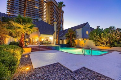 Located in the prestigious guard-gated Las Vegas Country Club
