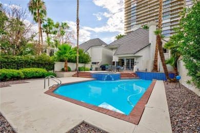 Located in the prestigious guard-gated Las Vegas Country Club