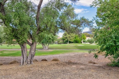Located in the prestigious guard-gated Las Vegas Country Club