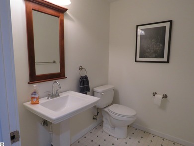 This charming condo offers stunning, expansive views of Lake