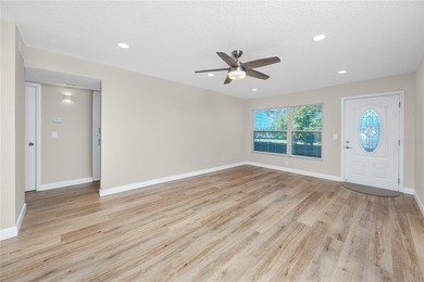 STUNNING CORNER UNIT & GOLFER'S DREAM!This completely remodeled