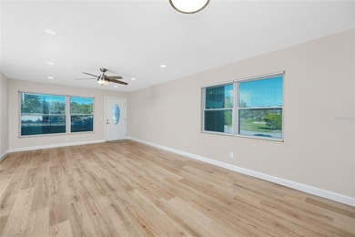 STUNNING CORNER UNIT & GOLFER'S DREAM!This completely remodeled