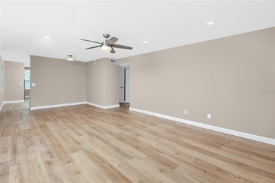 STUNNING CORNER UNIT & GOLFER'S DREAM!This completely remodeled