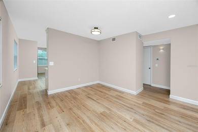 STUNNING CORNER UNIT & GOLFER'S DREAM!This completely remodeled