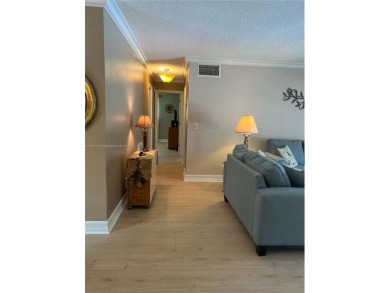 Step into coastal comfort with this spacious 2-bedroom, 2-bath