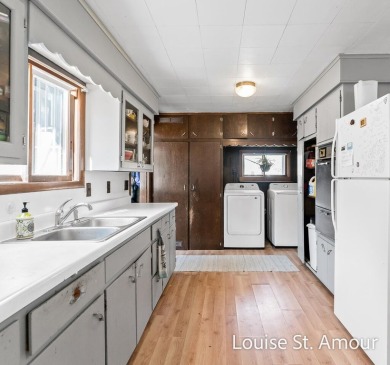 Main floor living with 3 bedrooms and a big backyard! Garage and