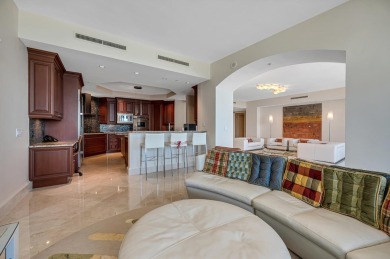 Contemporary elegance abounds in this luxury residence in gated