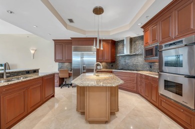 Contemporary elegance abounds in this luxury residence in gated