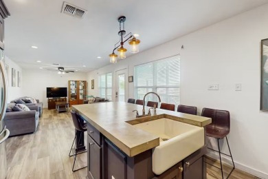 Discover the magic of coastal living with two vibrant waterfront