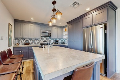 Discover the magic of coastal living with two vibrant waterfront