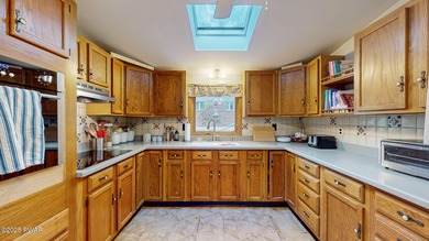 This beautifully remodeled raised ranch offers a comfortable and