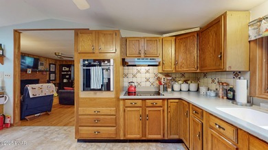 This beautifully remodeled raised ranch offers a comfortable and