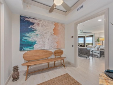 Experience refined coastal living in this elegant residence at