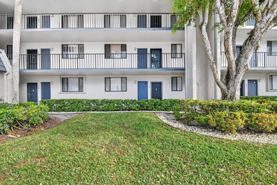 Completely renovated first-floor condo featuring 2 bedrooms and