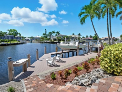 Discover this beautiful waterfront pool home, just minutes from
