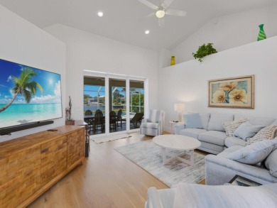 Discover this beautiful waterfront pool home, just minutes from