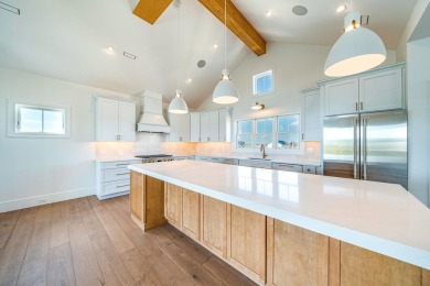 This single-family custom built home offers a level of island