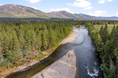 Set on nearly 22 acres with almost 2000 ft of prime Bitterroot