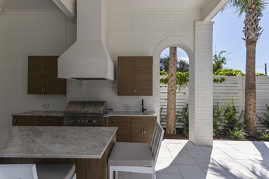 Experience refined coastal living in this newly built, fully