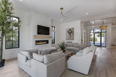 Experience refined coastal living in this newly built, fully