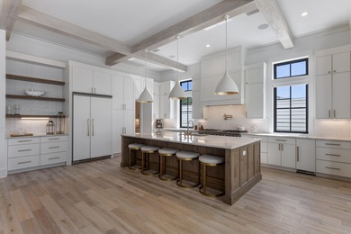 Experience refined coastal living in this newly built, fully