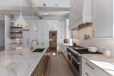 Experience refined coastal living in this newly built, fully