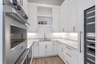 Experience refined coastal living in this newly built, fully