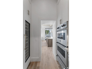 Experience refined coastal living in this newly built, fully