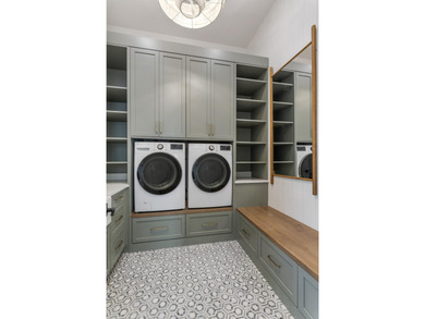 Experience refined coastal living in this newly built, fully