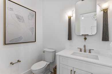 Experience refined coastal living in this newly built, fully